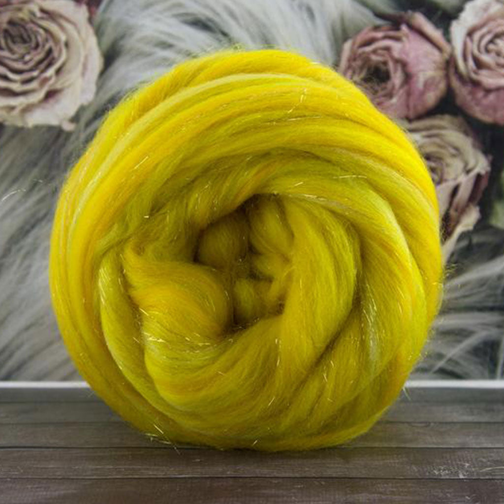 Color tale as old as time. A yellow and cream blend of merino and stellina spinning fiber.