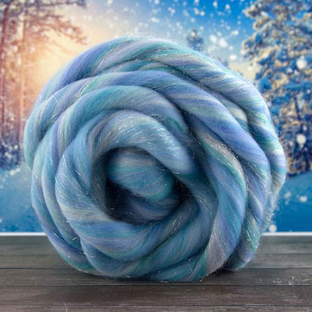 Color worth melting for. An ice blue and grey blend of merino and stellina spinning fiber.