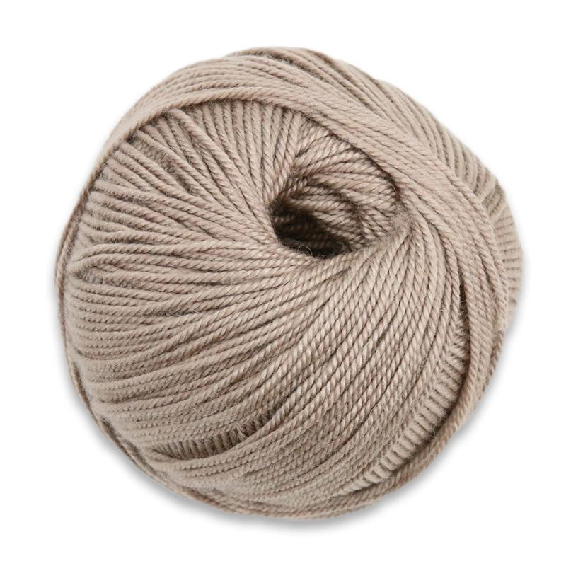 A Ball of Plymouth Cuzco Cashmere yarn - Champagne, a light brown