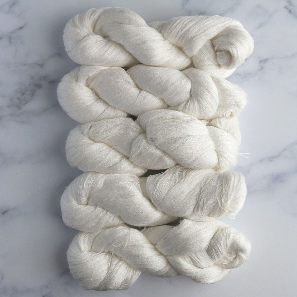 5 skeins of Paradise Fibers 28/2 Undyed Silk Throwster Yarn.