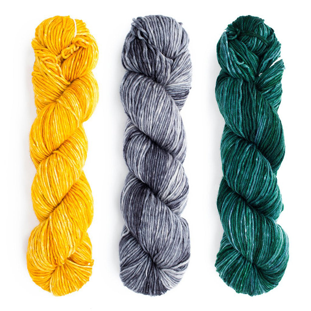 3 skeins of Monokrom Worsted, colors 4053, 4064, & 4065, showing the depth of color this line has