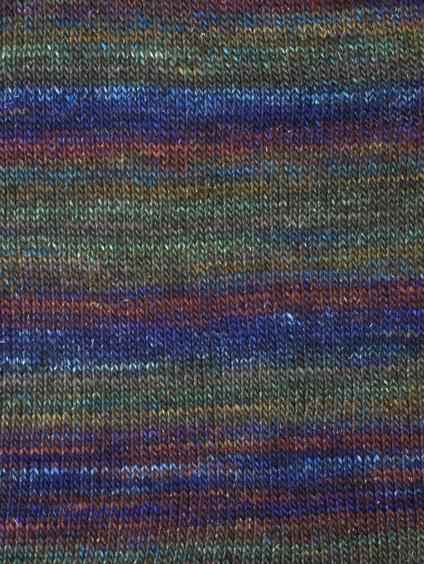 Night Sky 8847, a blue, green and red skein of Berroco Millefiori Light Luxe