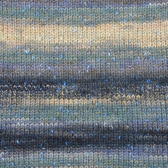 Salt & Pepper 7406. A self striping yarn with tan, teal, blue and black.