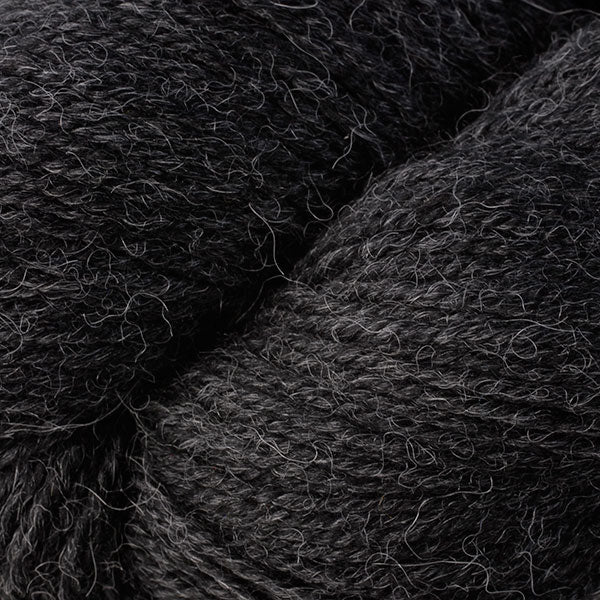 Charcoal Mix 6289, a dark heathered grey skein of Ultra Alpaca Worsted.