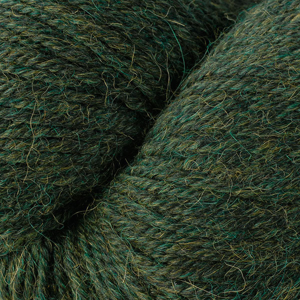 Peat Mix 6277, a dark heathered green skein of Ultra Alpaca Worsted.