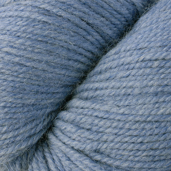 Stone Washed Mix 6278, a pale heathered blue skein of Ultra Alpaca Worsted.