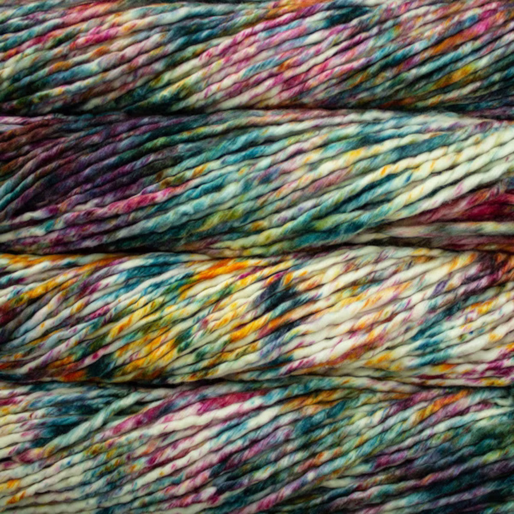 Color: Molino 185. A green, pink, and white speckled variant of Malabrigo Rasta yarn. 