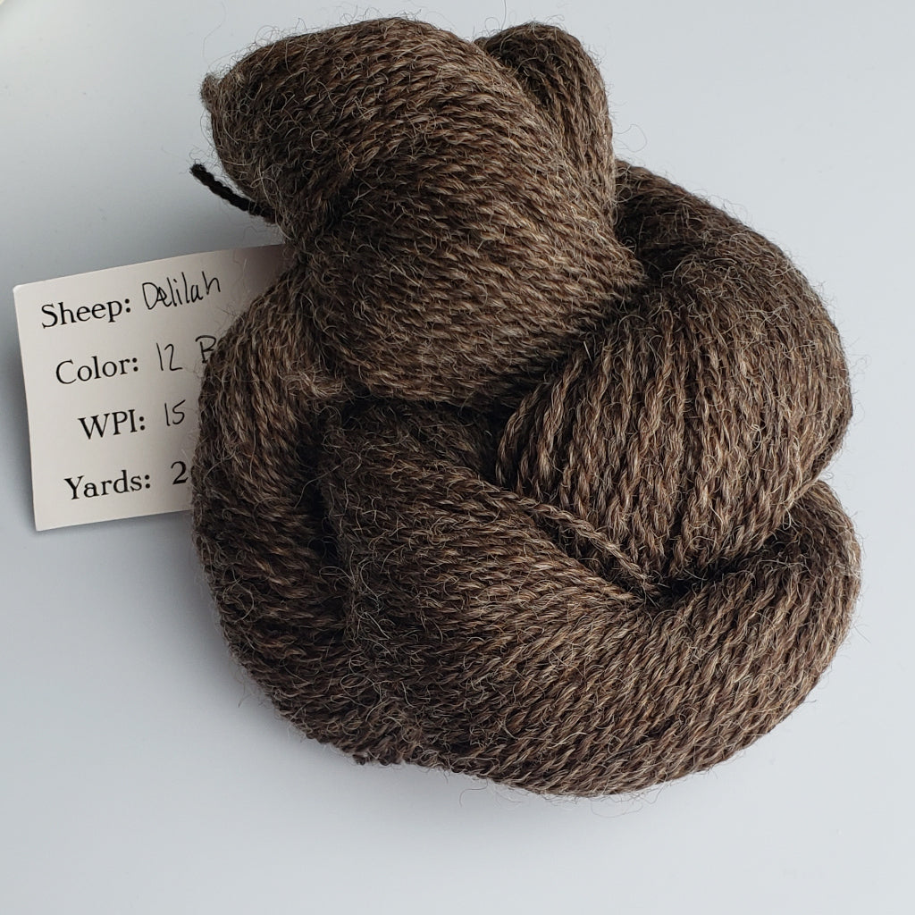 Color Delilah 2012B. A natural brown 100% wool sport weight yarn from Spoiled Sheep Yarn.