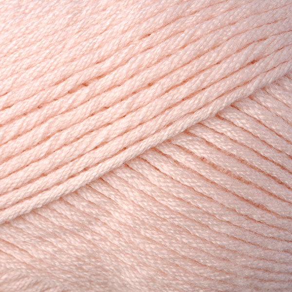Color Peach 9704. A light pink skein of Berroco Comfort Worsted washable yarn.