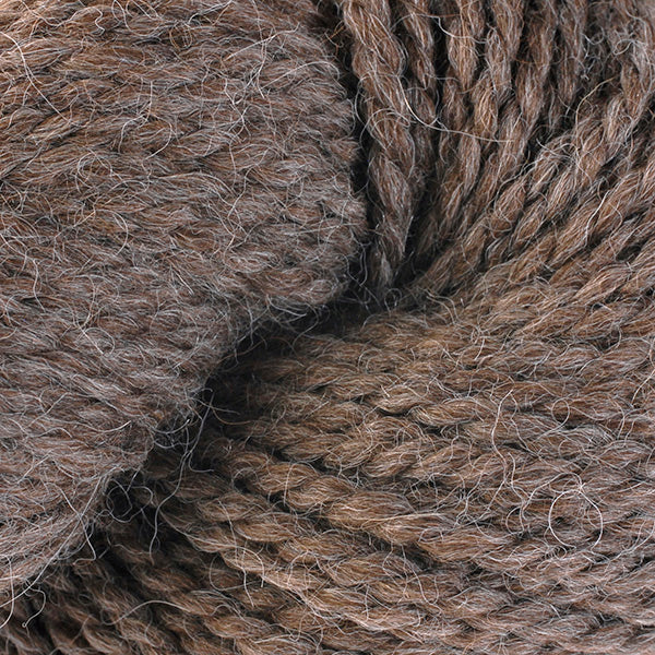 Buckwheat 7204, a light heathered brown skein of Ultra Alpaca Chunky.