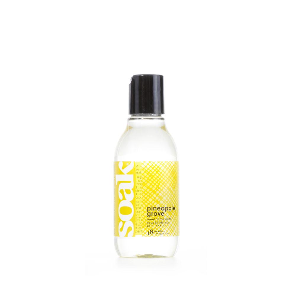 A 3 oz bottle of Pineapple Grove scented SOAK Wash.
