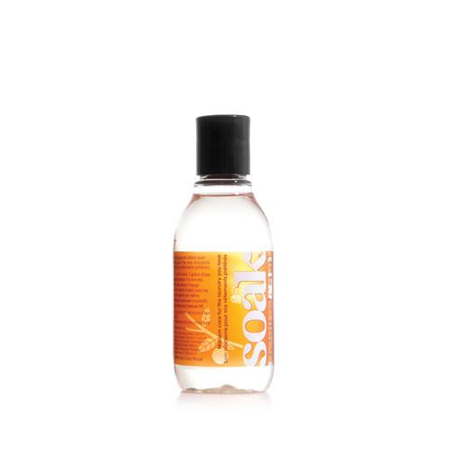 A 3 oz bottle of Yuzu scented SOAK Wash.