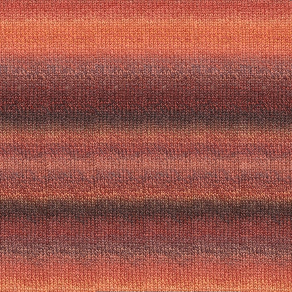 Queensland Collection Perth yarn in Great Sandy, colorful stripes of reds and oranges.