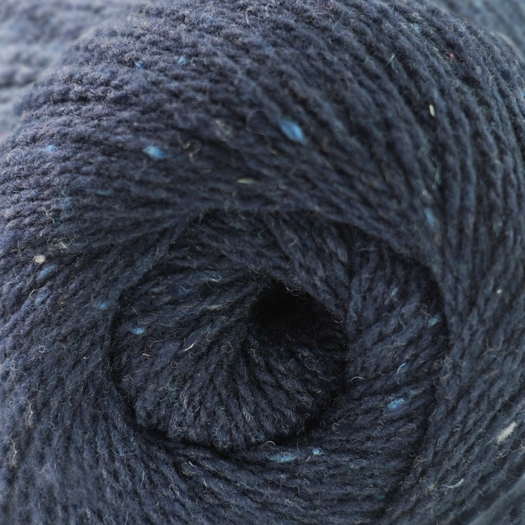 Cascade Aegean Tweed in Dark Sapphire - a grey-blue tweed colorway with light blue speckles