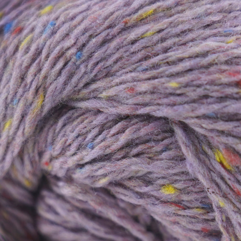 Cascade Aegean Tweed in Lilac - a lilac purple tweed colorway with yellow, red and blue speckles