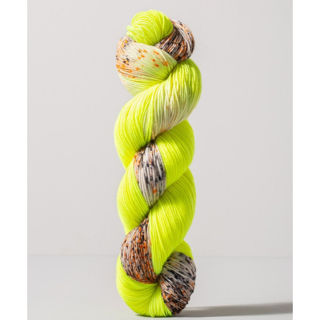 Gusto Wool Carmen Fingering 1401 - a neon yellow and speckled white, grey and orange colorway