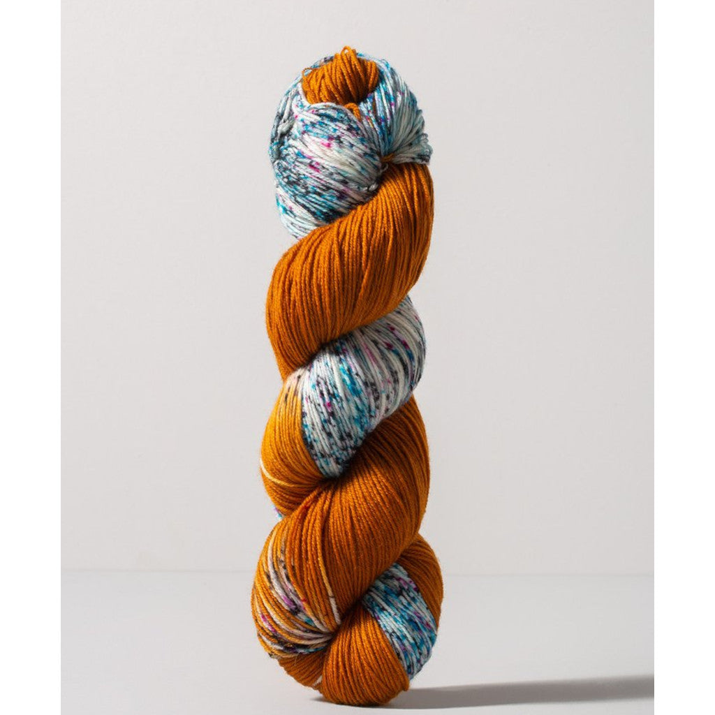 Gusto Carmen Fingering 1403 - burnt orange colorway with speckled white, bright blue and magenta 