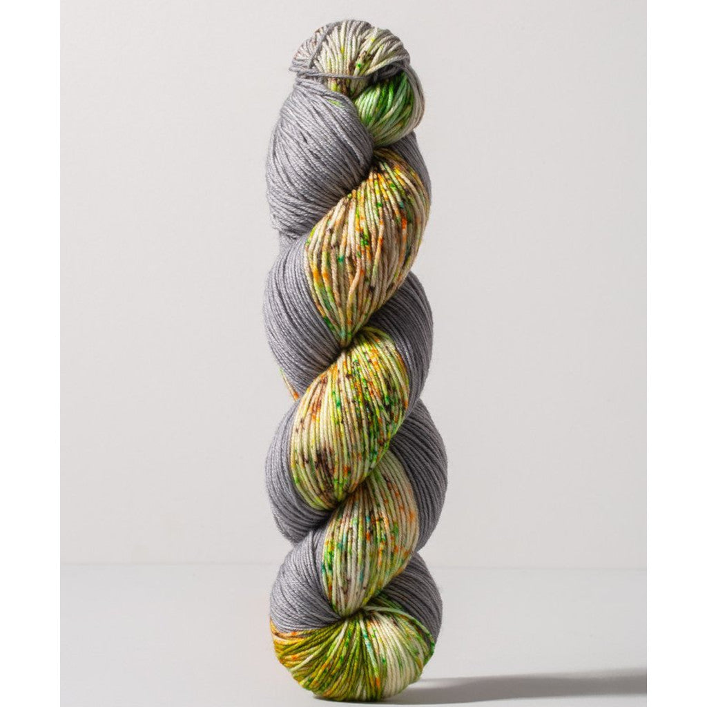 Gusto Wool Carmen Fingering 1405 - a grey colorway with speckled white, yellow, orange and green