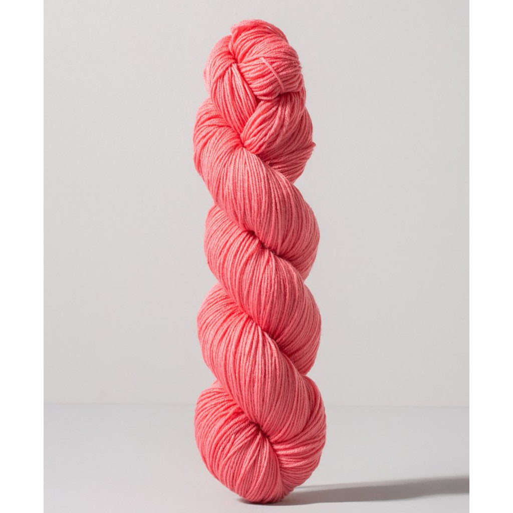 Gusto Wool Core Fingering 1029 - a coral pink colorway