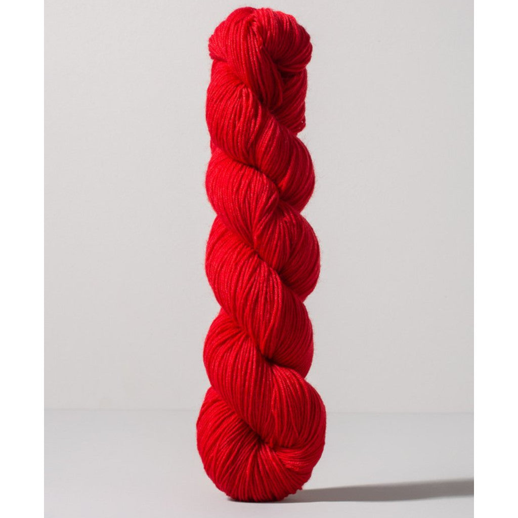 Gusto Wool Core Fingering 1032 - a bright red colorway