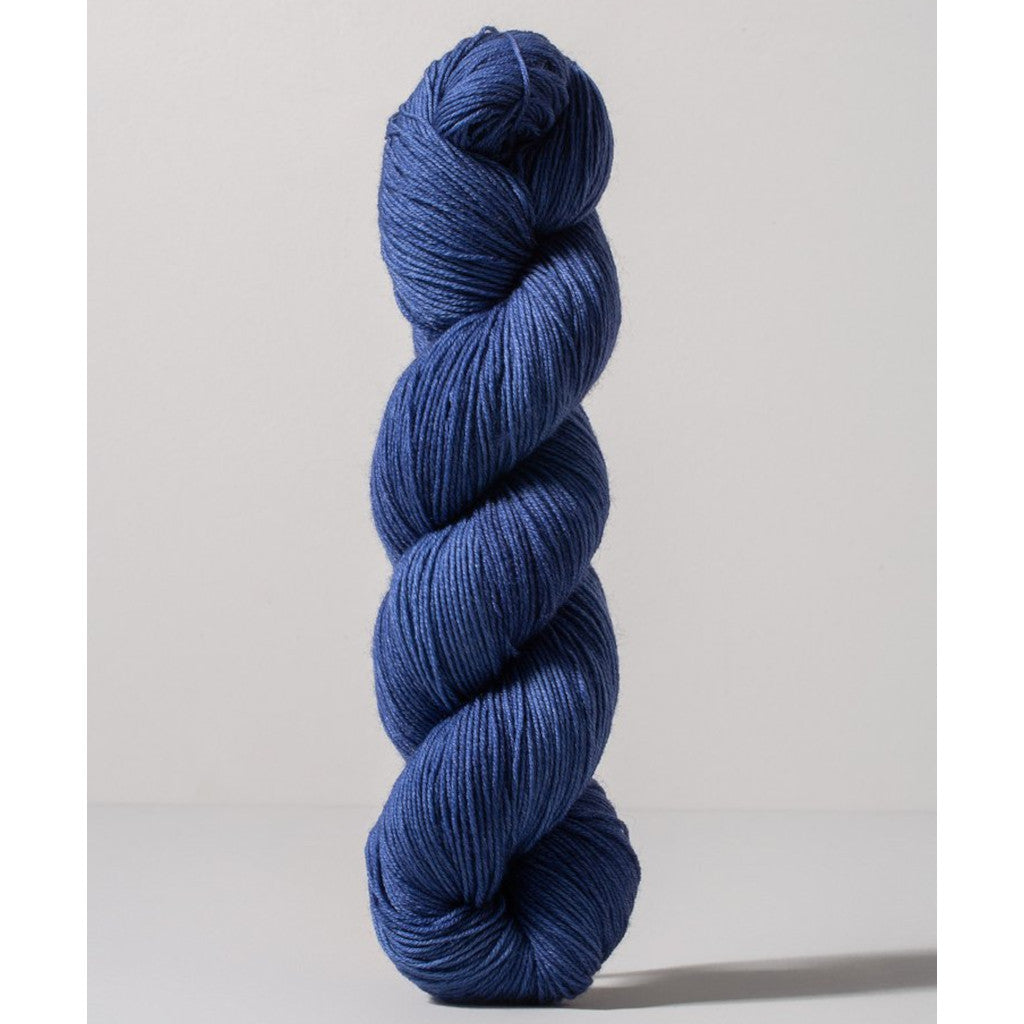 Gusto Wool Core Fingering 1042 - a mid navy blue colorway