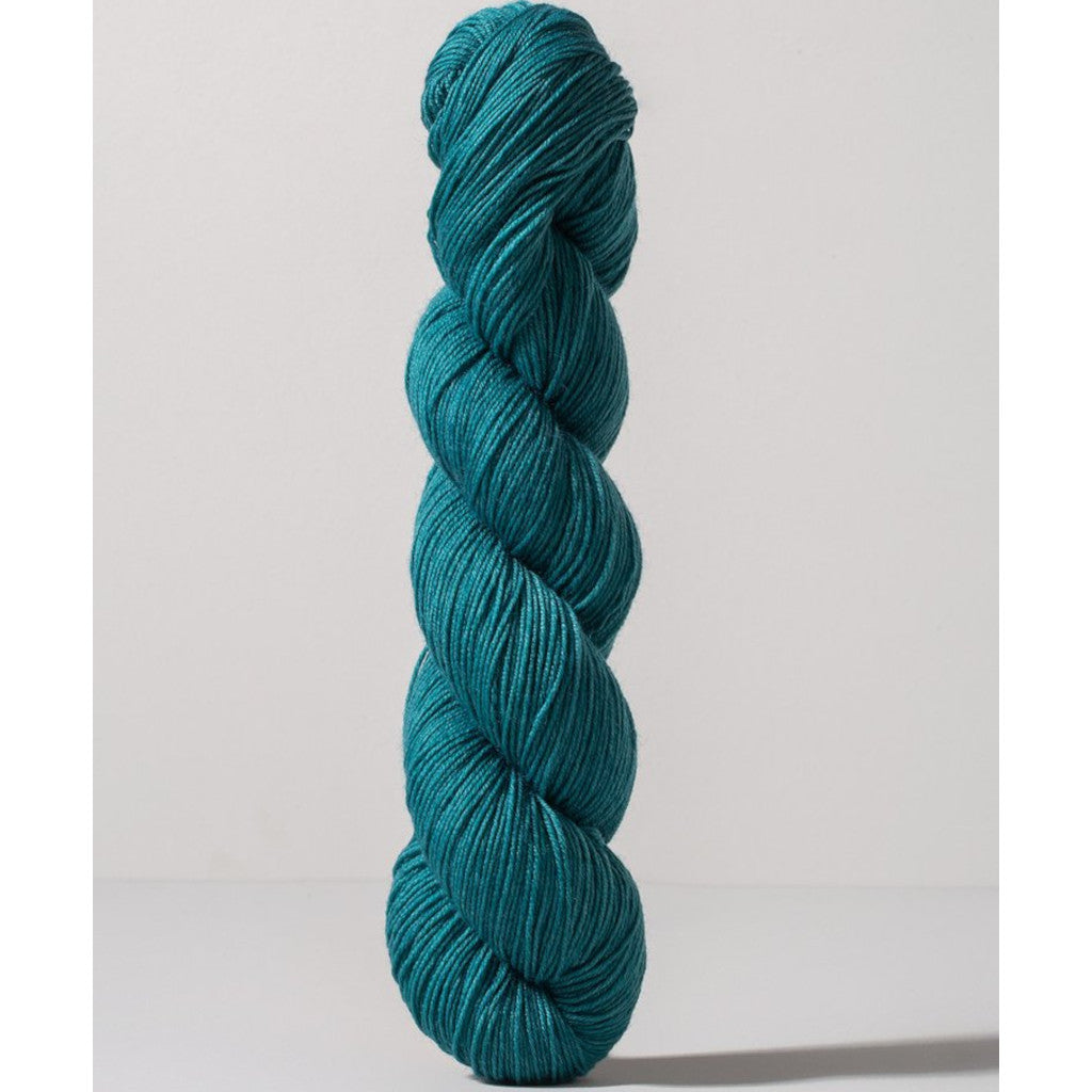Gusto Wool Core Fingering 1045 - a dark teal colorway