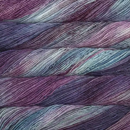 Malabrigo Mechita Lotus Yarn - a variegated light teal and purple colorway