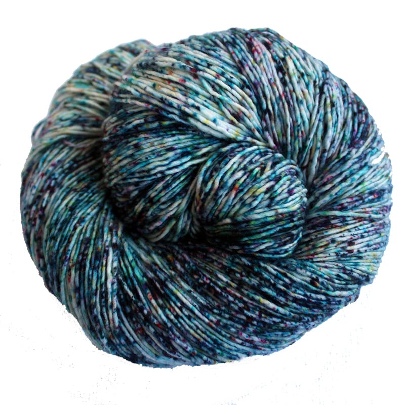 Malabrigo Mechita Piano Yarn - a speckled white, turquoise, yellow and magenta colorway