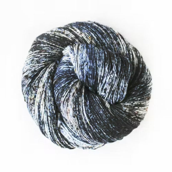 Malabrigo Mechita Storm Yarn - a variegated white, black and blue colorway