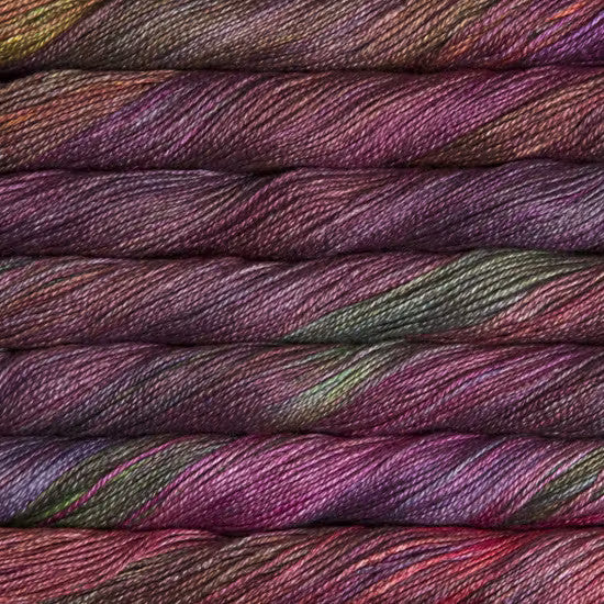Malabrigo Mora Fingering in Diana - a variegated purple, green, red and yellow colorway
