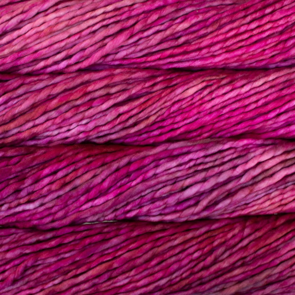 Color: English Rose 057. A bright pink variegated variant of Malabrigo Rasta yarn. 
