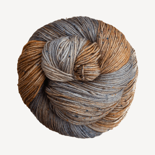 Malabrigo Sock Yarn in Sneezy - a variegated tan and blue-grey colorway