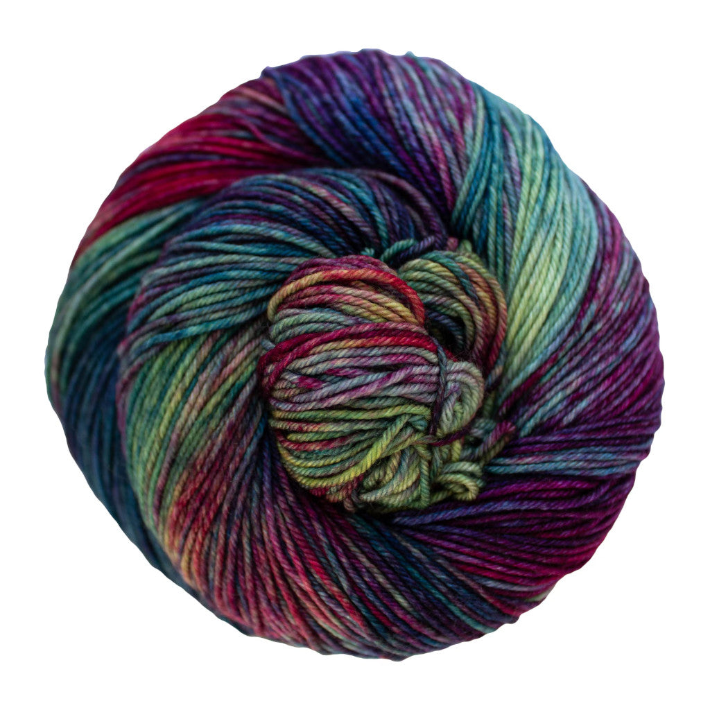 Color: Aniversario 005. A multi-colored, rainbow skein of Malabrigo Ultimate Sock yarn
