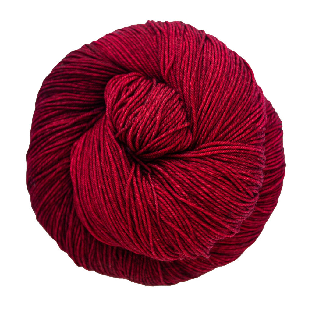 Color: Cereza 033. A deep red variegated skein of Malabrigo Ultimate Sock yarn