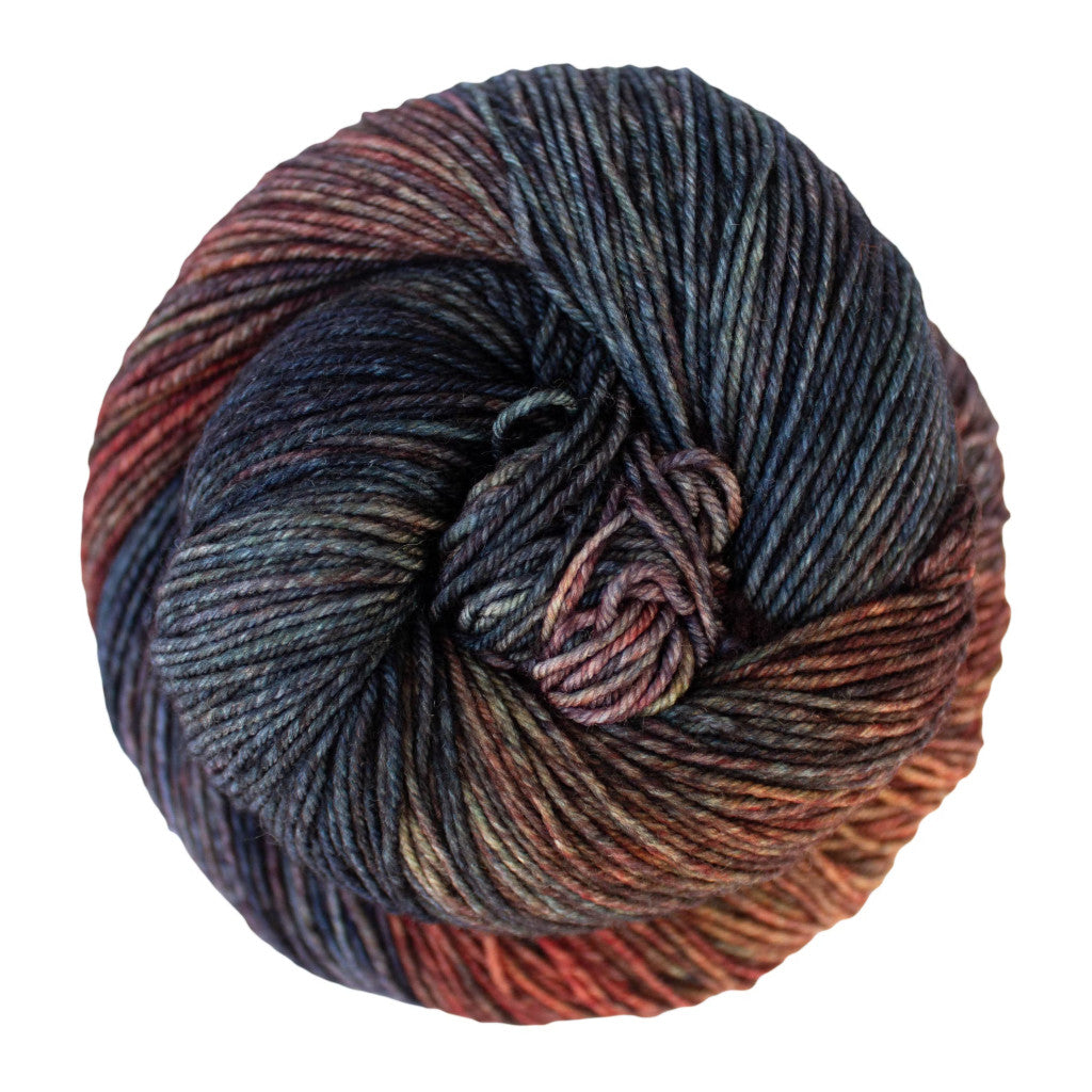 Color: Pocion 139 . A light blue, red and orange variegated skein of Malabrigo Ultimate Sock yarn
