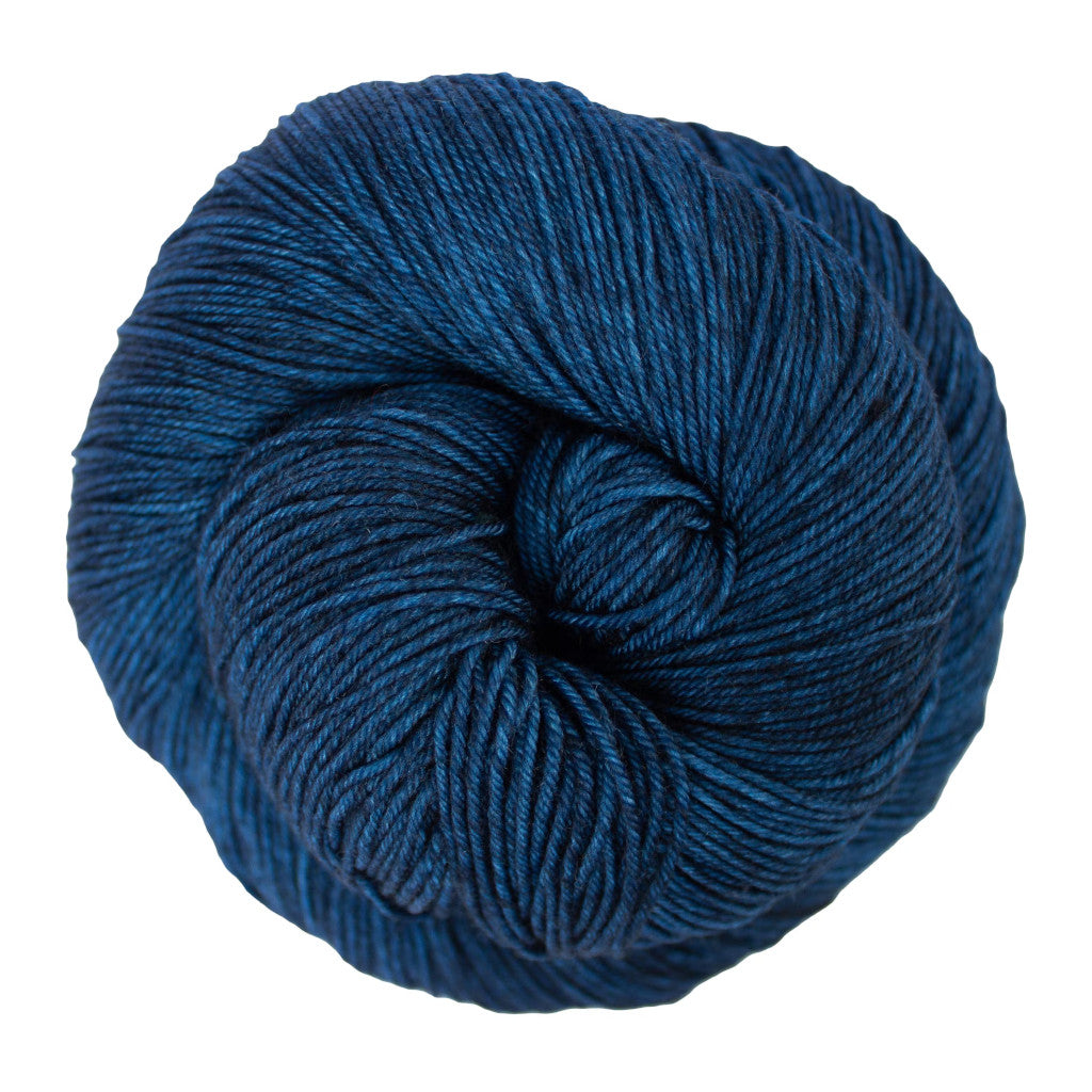 Color: Azul Profundo 150 . A deep, ocean blue variegated skein of Malabrigo Ultimate Sock yarn