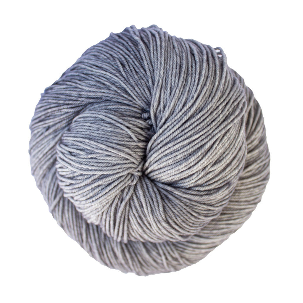 Color: Gris 212 . A light grey variegated skein of Malabrigo Ultimate Sock yarn