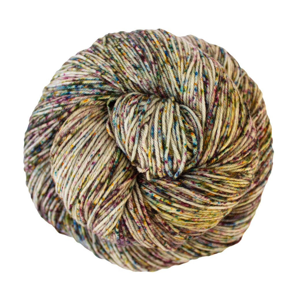 Color: Myths 344. A yellow, blue, maroon and blue speckled skein of Malabrigo Ultimate Sock yarn
