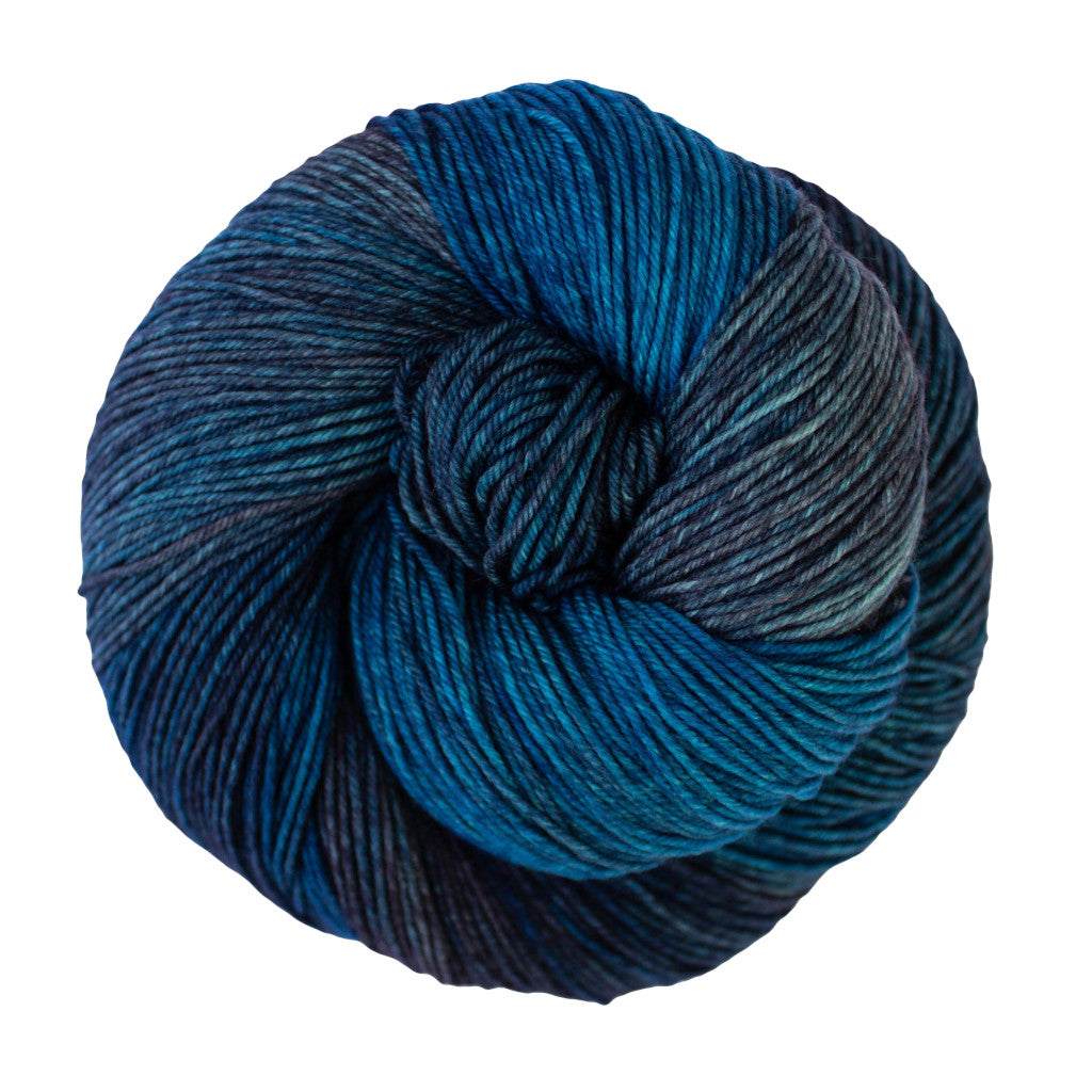 Color:Under the Sea 362.An ocean blue and dark grey variegated skein of Malabrigo Ultimate Sock yarn