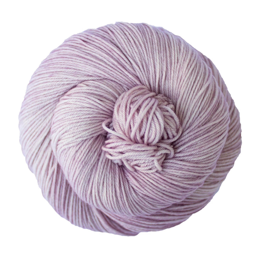Color: Neverland. A Rose pink variegated skein of Malabrigo Ultimate Sock yarn