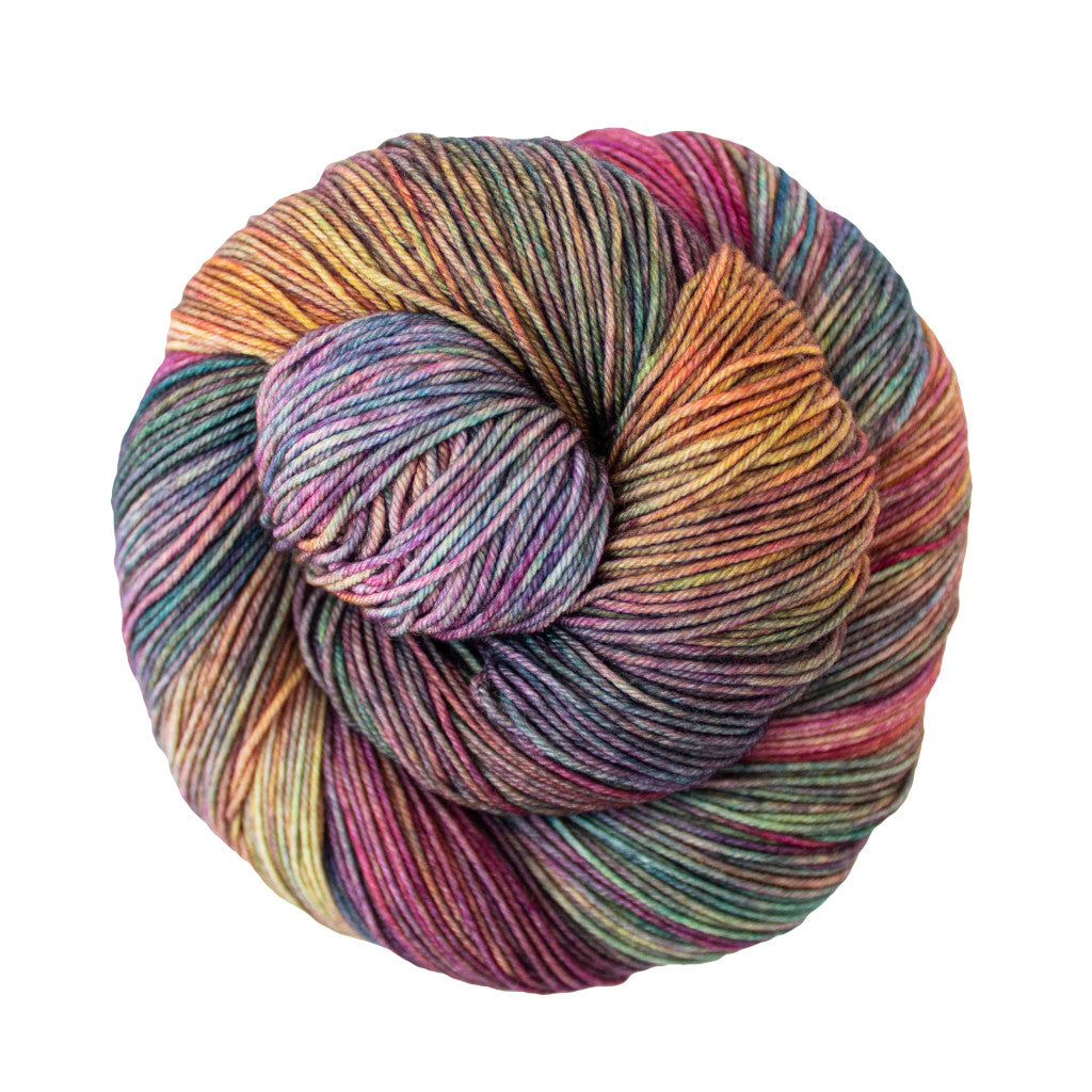 Color: Arco Iris 866. A rainbow multi-colored skein of Malabrigo Ultimate Sock yarn