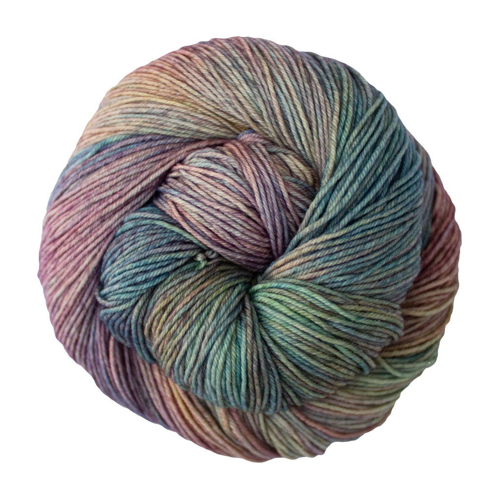 Color: Arapey 875. A pale pink, green and tan variegated skein of Malabrigo Ultimate Sock yarn