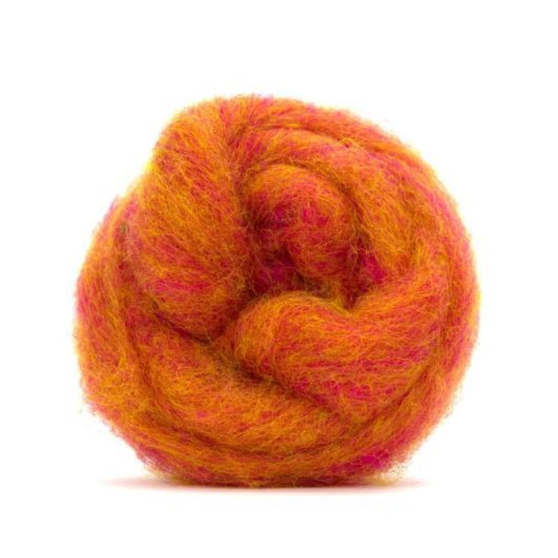 A orange and red shade of carded corriedale wool roving.