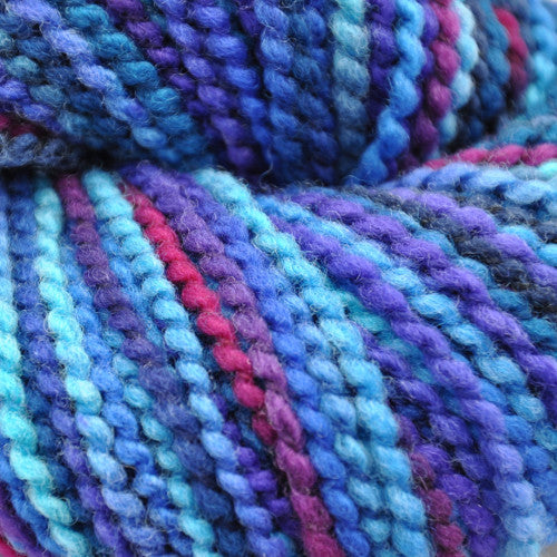 Brown Sheep Lana Boucle' in Restless Sea - a variegated colorway in violet, magenta, and light blue