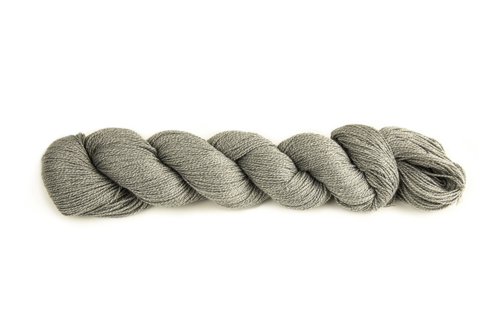 HiKoo's Popcycle yarn in the color Glee 3007, a medium grey marled with white.