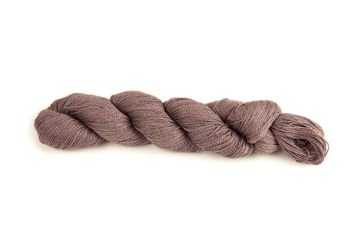 HiKoo's Popcycle yarn in the color Merry 3009, a reddish, purplish brown marled with white.