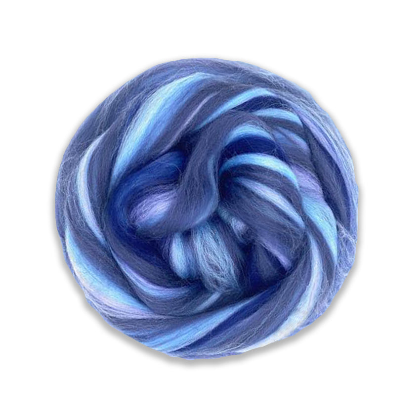 Color Typhoon. A multi colored merino blend of lavender, sky, royal, aqua, and navy blue shades.