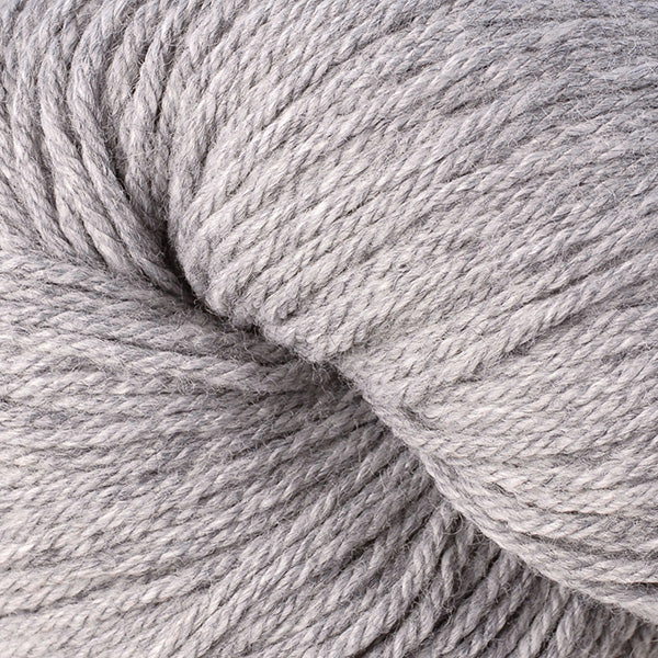 Berroco Vintage Worsted weight yarn in the color Smoke 5106, a light slightly heathered grey.