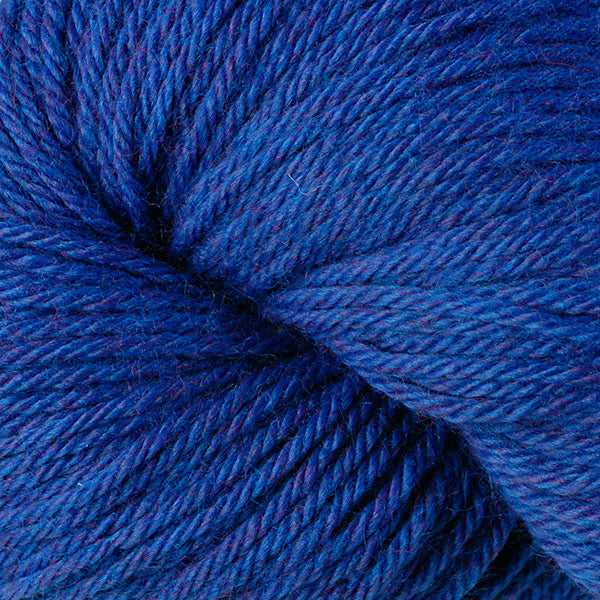 Berroco Vintage Worsted weight yarn in the color Blue Moon 51191, a vibrant heathered blue.