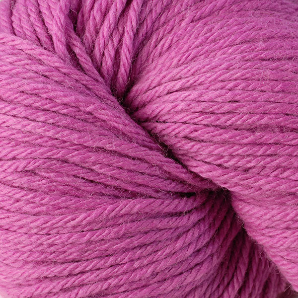 Berroco Vintage Worsted weight yarn in the color Blush 5123, a bright pink.